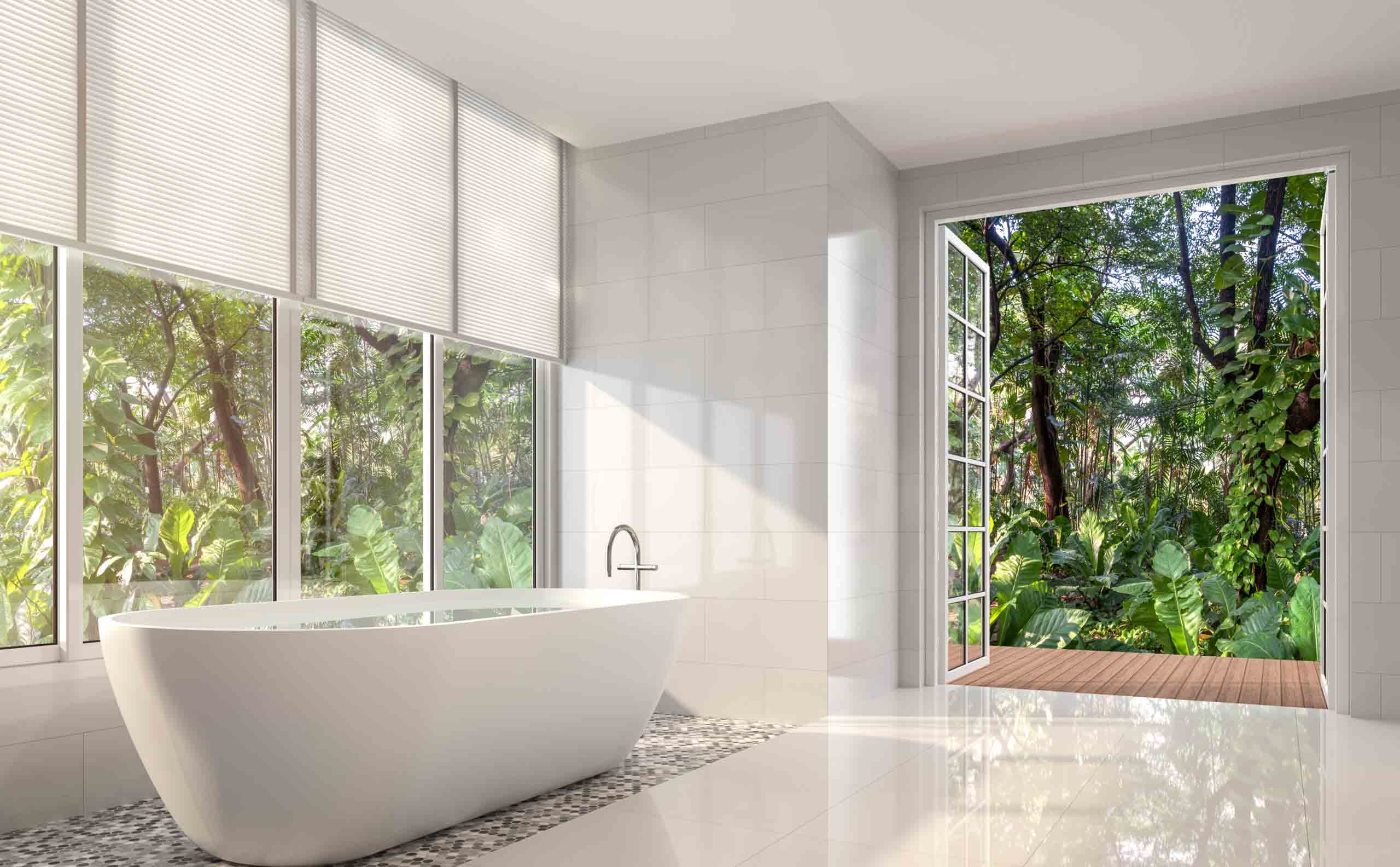 A sleek, modern styled white bathroom with large windows with film on them,