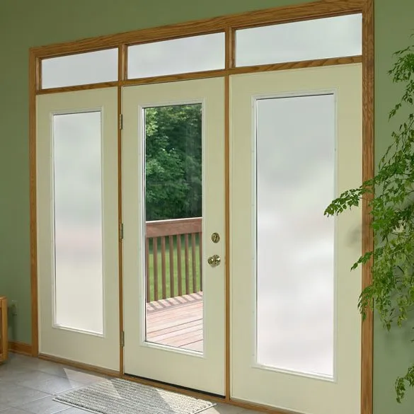 A three panel door with privacy film.